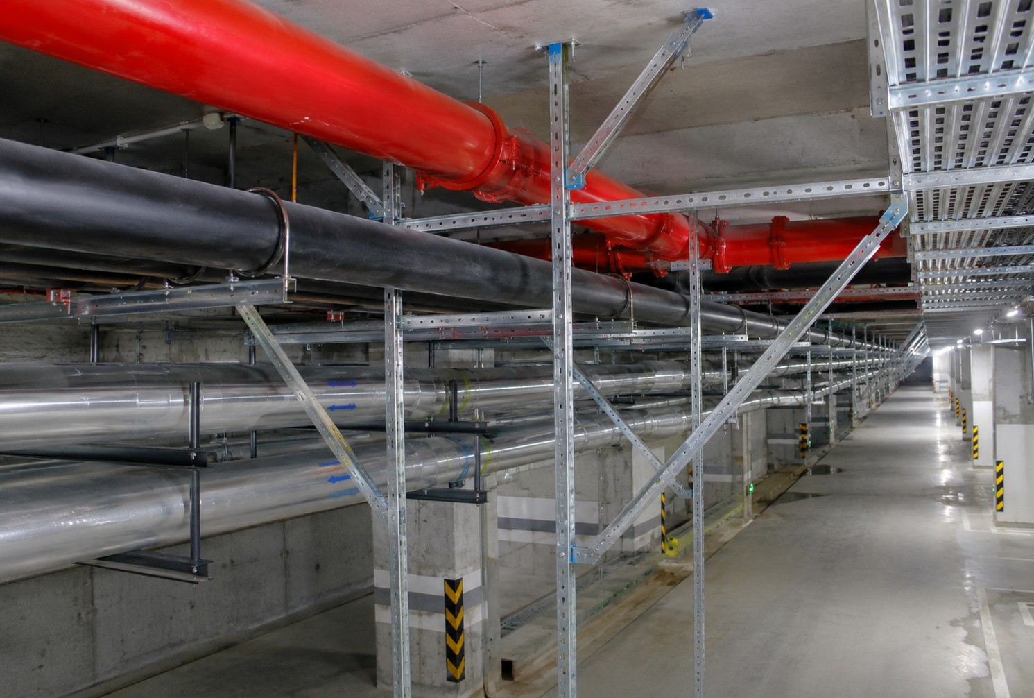 Seismic bracing on a basement pipe rack